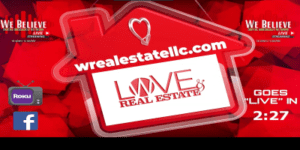 A red sign that says love real estate.